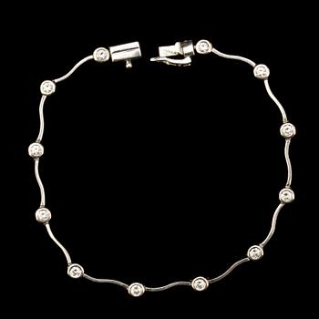 ARMLÄNK, 14k vitguld med briljantslipade diamanter ca 0,96 ct. Vikt 8g.