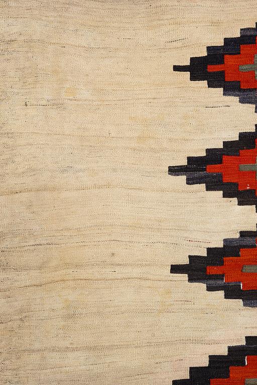 A semi-antique Qashqai kilim, c. 350 x 188 cm.