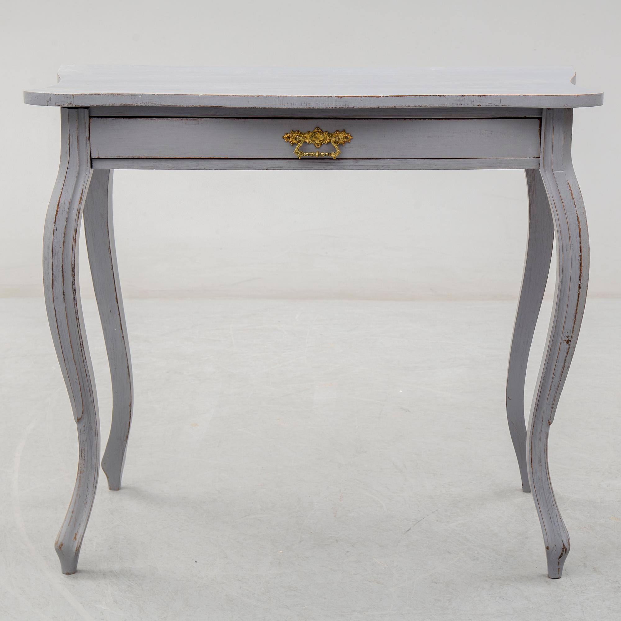 A circa 1900 Rococo style writing desk.