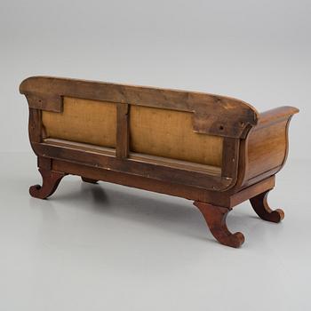 A mid 19th century late empire sofa.