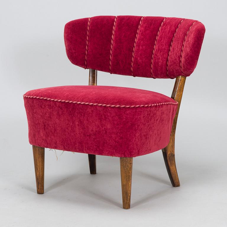 Lisa Johansson-Pape, a 1940s armchair for Oy Stockmann Ab, Keravan puusepäntehdas.