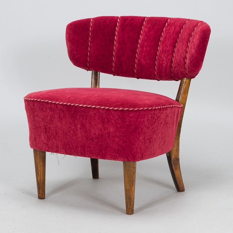 Lisa Johansson-Pape, a 1940s armchair for Oy Stockmann Ab, Keravan puusepäntehdas.