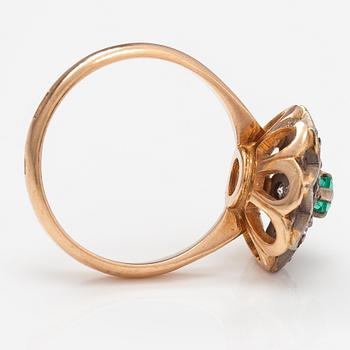 A 14K gold ring with diamonds ca. 0.40 ct in total and an emerald. Yerevan.