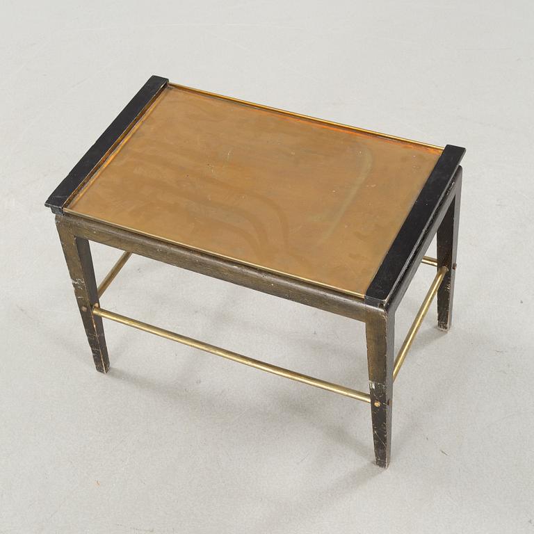 A tray table from the first half of the 20th century by Ystad Brons.