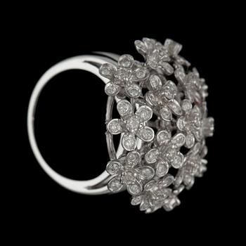 A diamond, 1.29 cts in total, ring. Diamonds in moveable flower settings.
