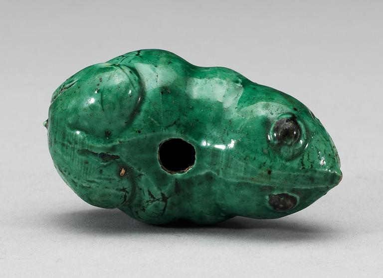 A green glazed biscuit water dropper, in the shape of a frog, Qing dynasty, Kangxi (1662-1722).