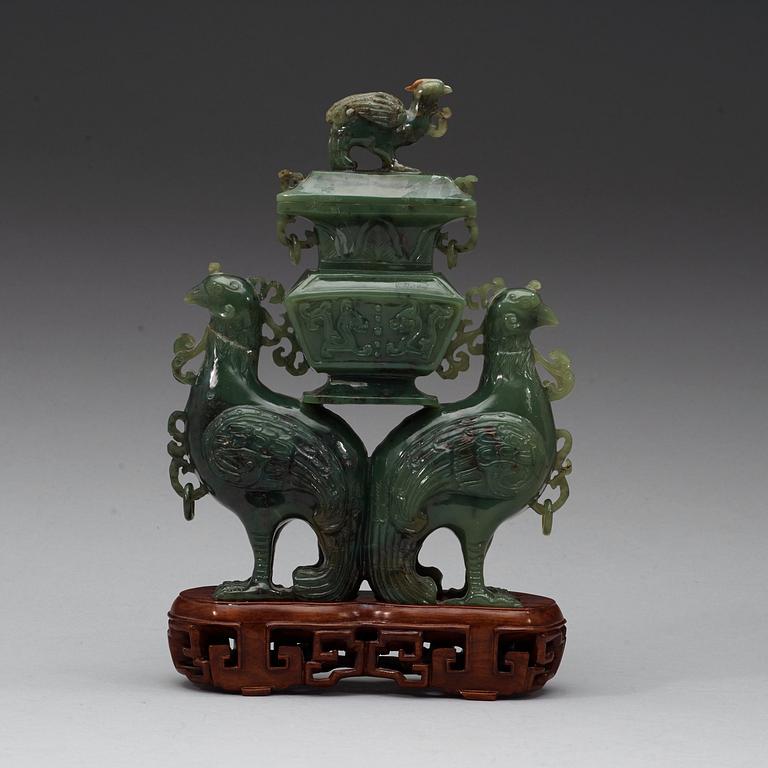 A moss green jade double fenix figurine, 20th century.