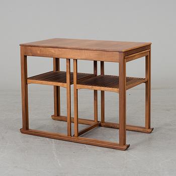 CARL MALMSTEN, a 'Släden' nest of three mahogany tables.