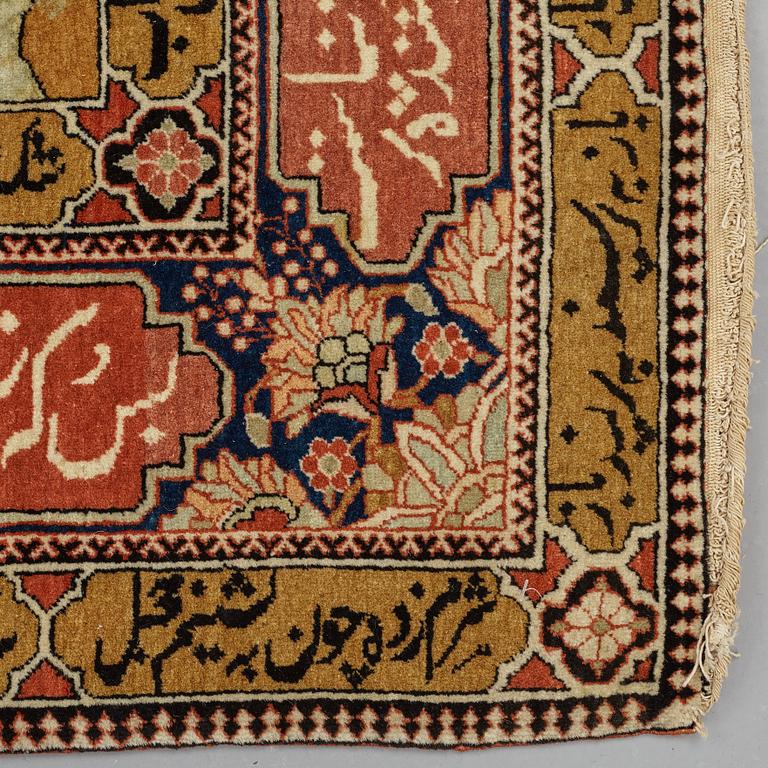 A RUG, a semi-antique Kashan figural, possibly Motachem, ca 202 x 140 cm.