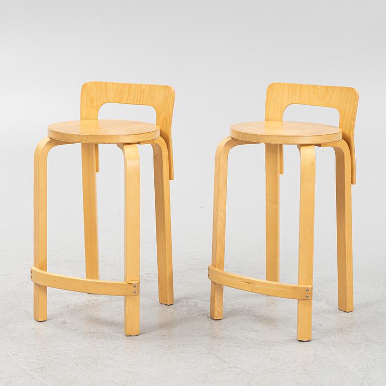 Alvar Aalto, a pair of model 'K65' birch bar chairs, Artek, Finland.