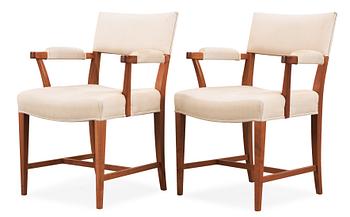 A pair of Josef Frank mahogany dining chairs, Svenskt Tenn, model 695.
