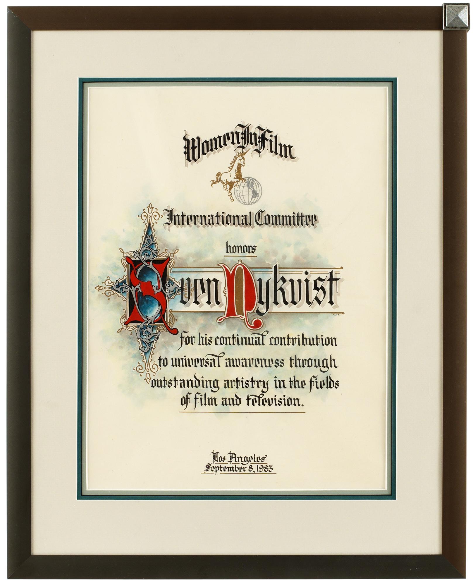 AN AWARD, Women in Film International Committee 1983.