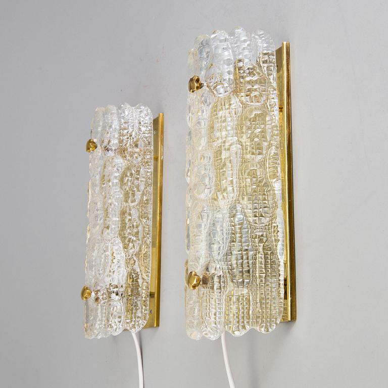 A pair of wall lamps by Carl Fagerlund, 20th century.