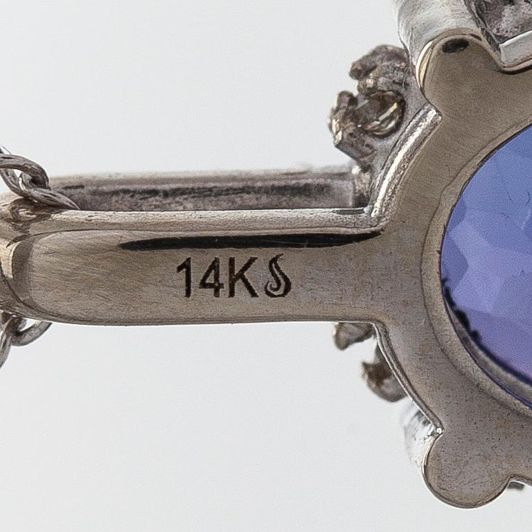 Kaulakoru, 14K valkokultaa, riipus tansaniitti ja timantteja.