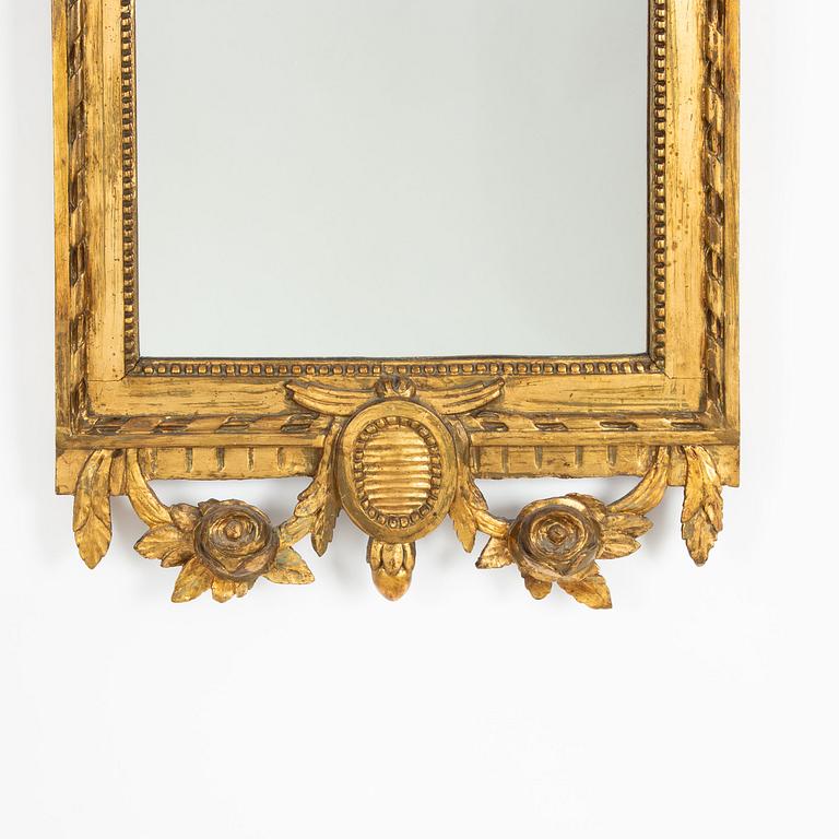 A Gustavian giltwood mirror, late 18th century.