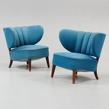 A pair of Otto Schulz easy chairs, Jio-Möbler, Jönköping Sweden probably 1950's.