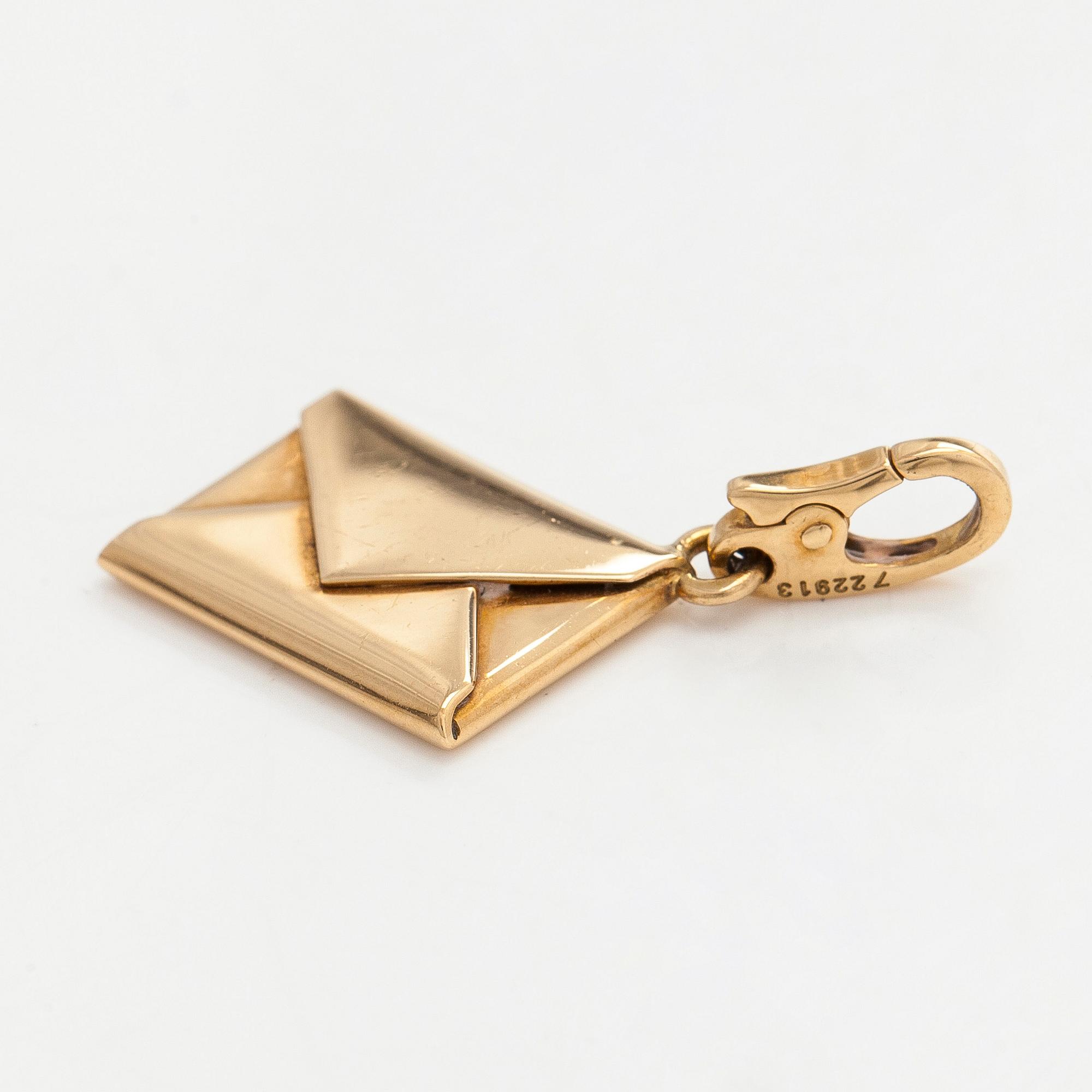 Cartier, an 18K gold letter pendant/charm.