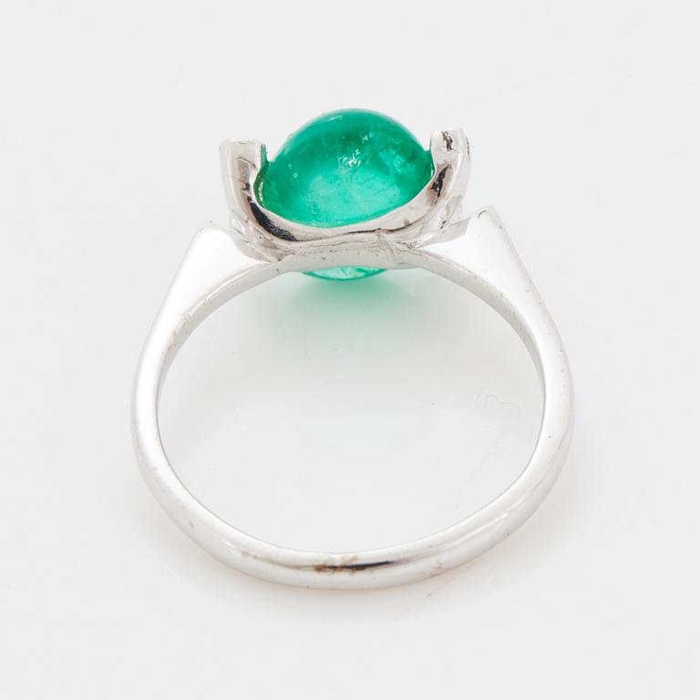 18K white gold cabochon emerald and diamond ring.