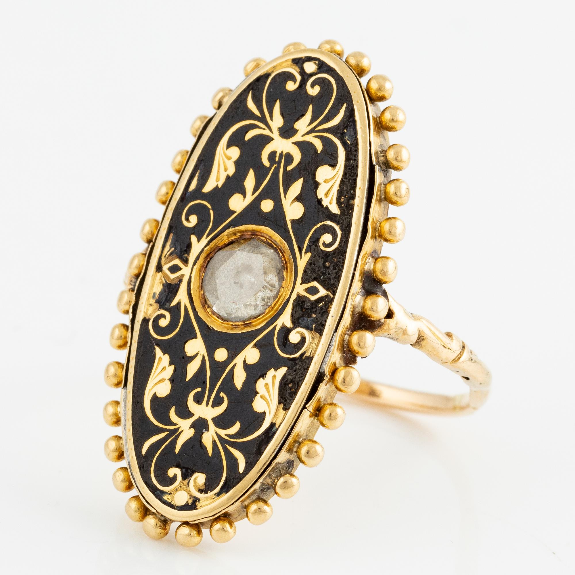 Ring, oval shape, 18K gold with black enamel and rose-cut diamond, 19th century.