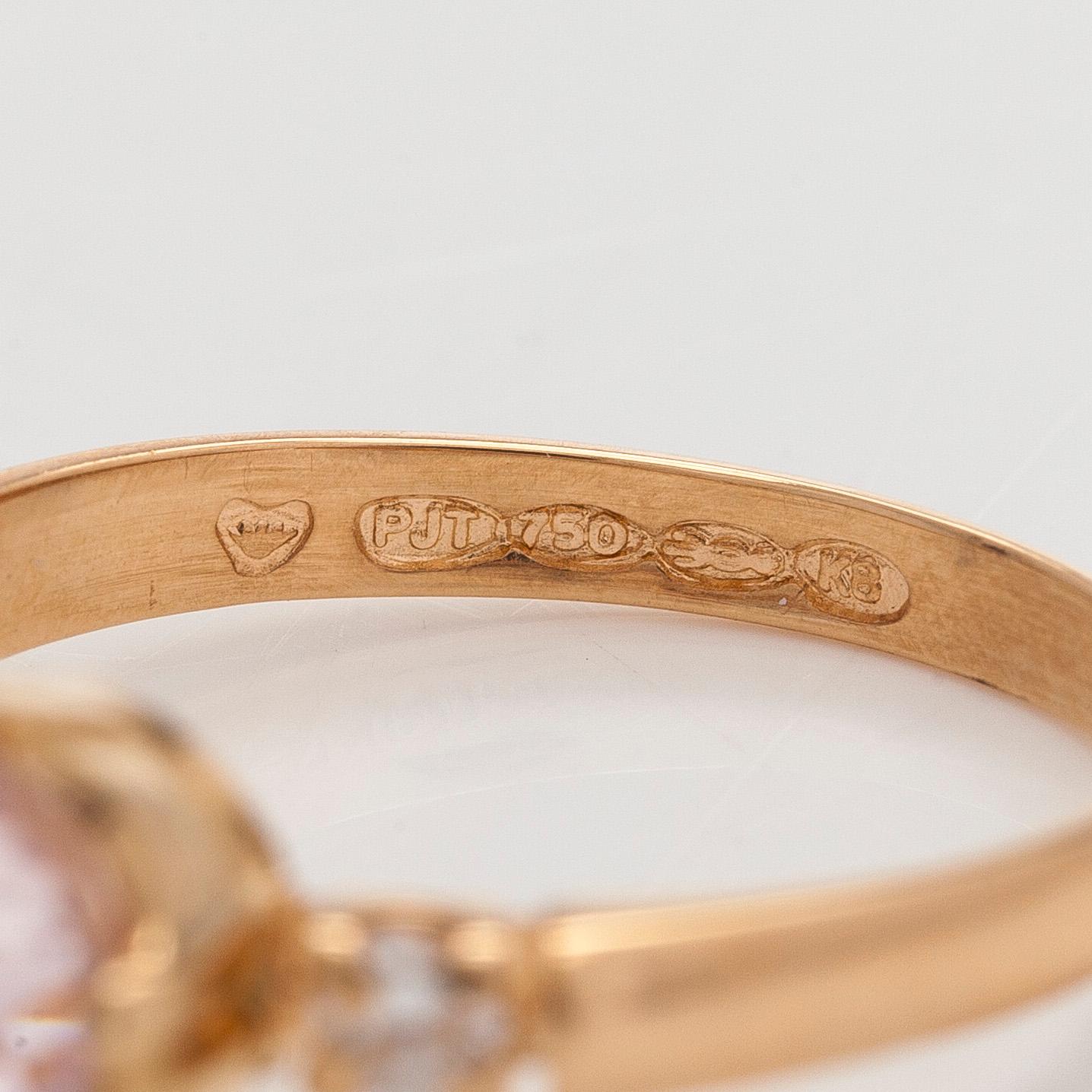 Sormus, 18K kultaa, kunziitti ja timantteja.