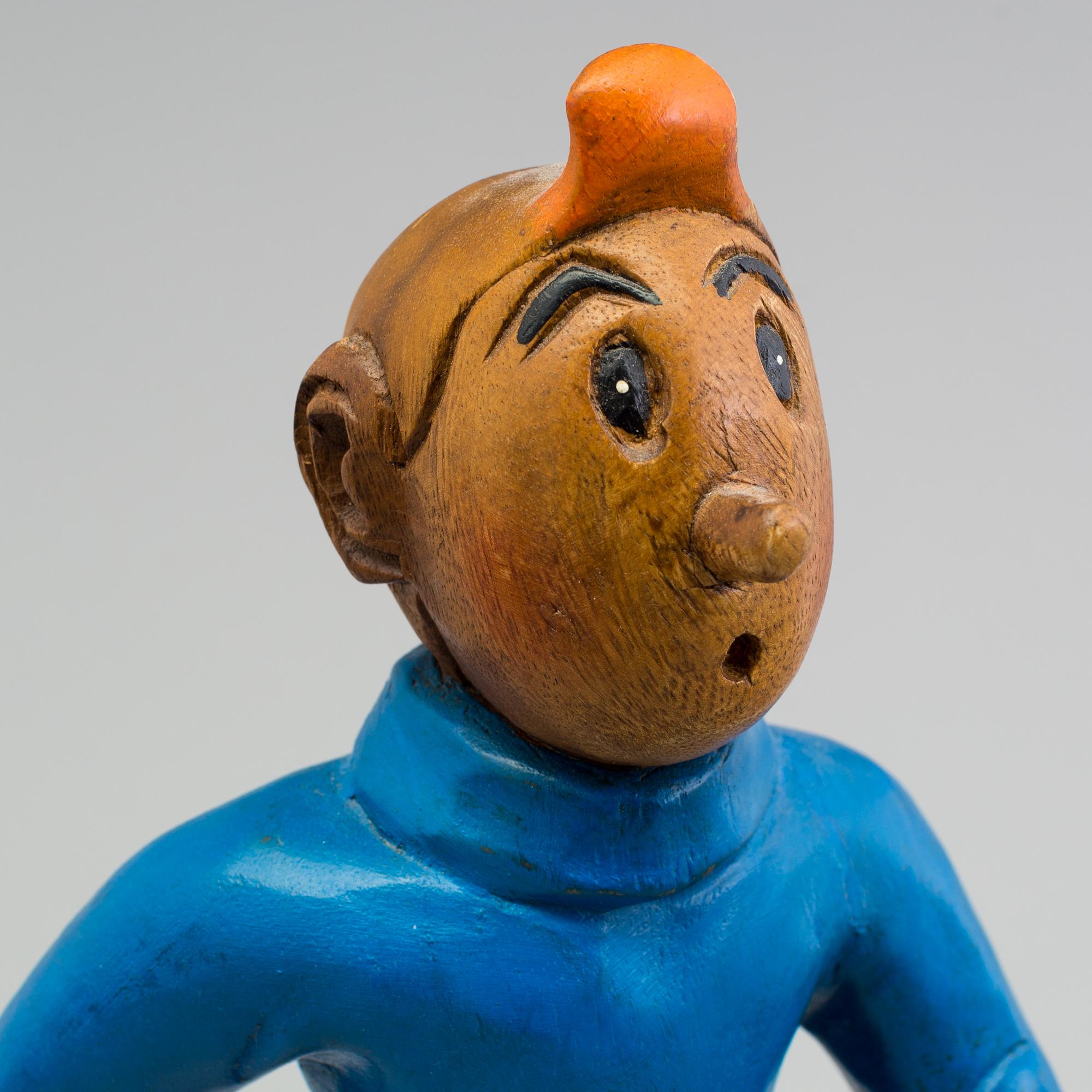 a Tintin and snowy wood scuplture from the second half of the 20th century.