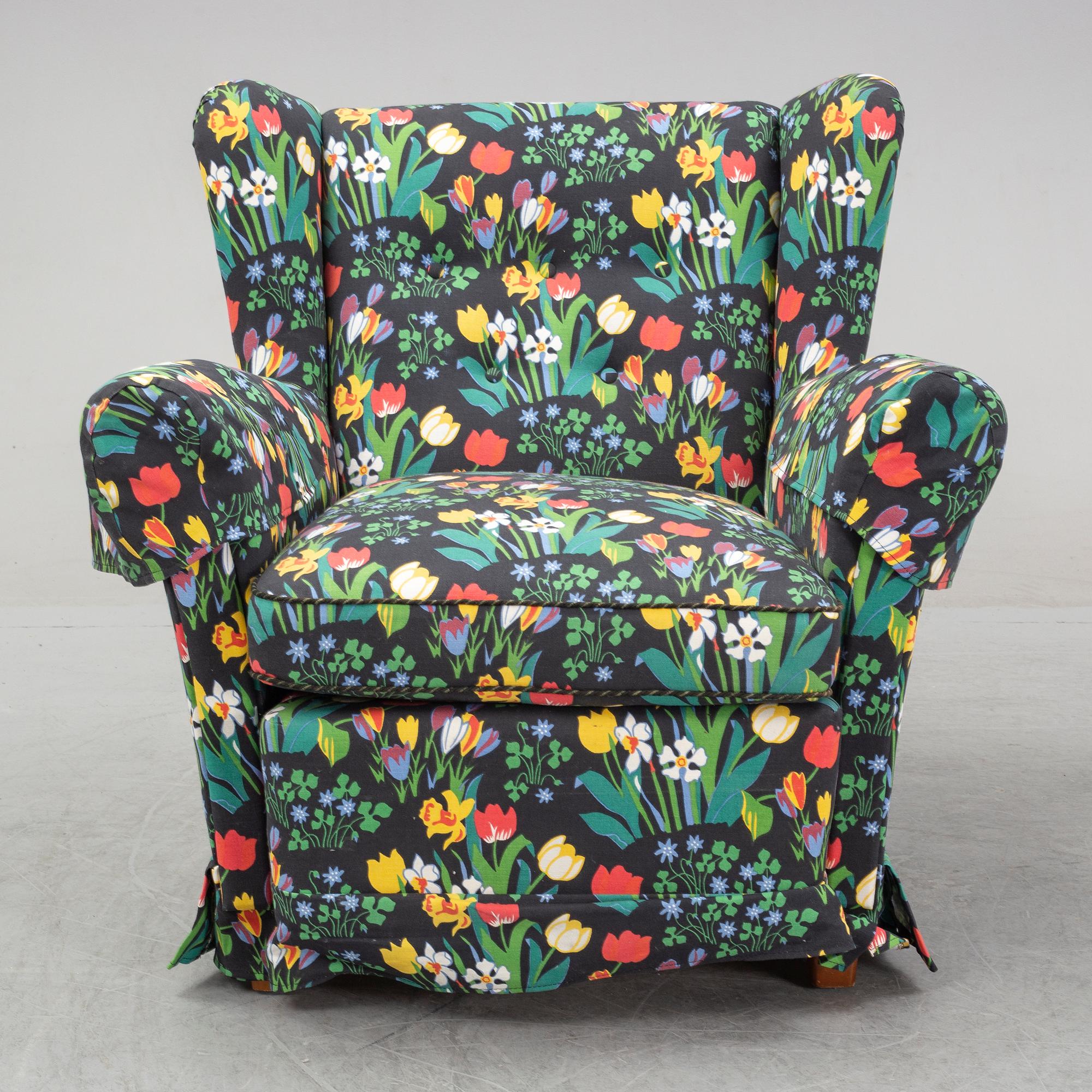 A sofa and wingback chair, later part of the 20th Century.