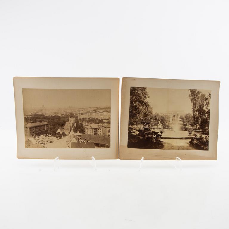 Fotografier 8 st olika byggnader från München omkring 1900.