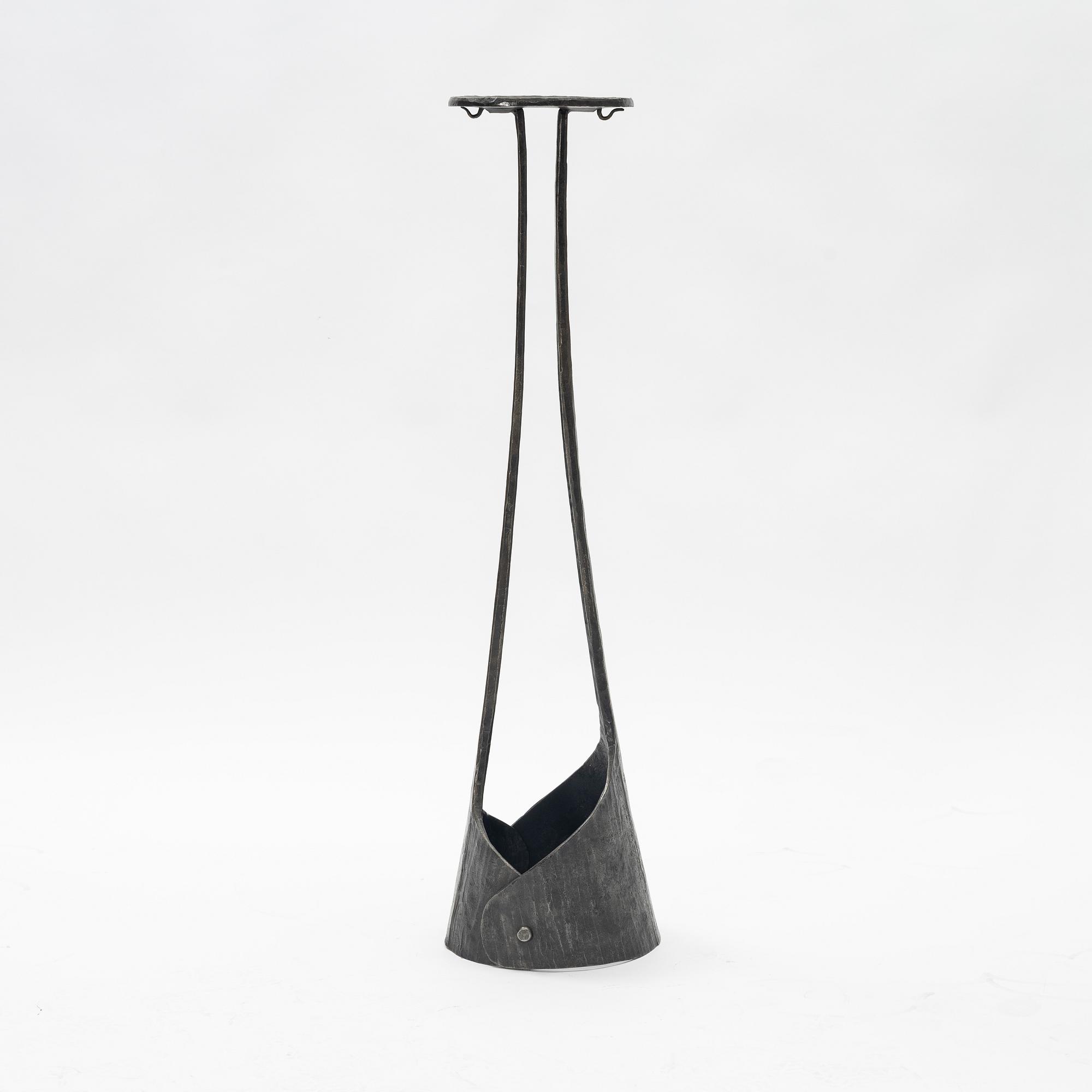 A cast iron pedestal, 20th century.