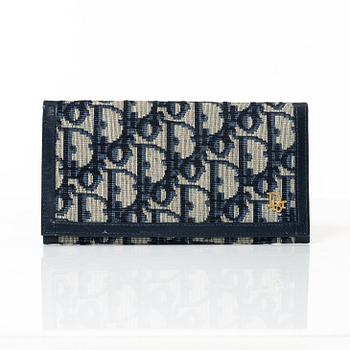 Christian Dior, a wallet.