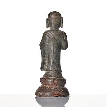 A bronze sculpture of Ananda, Ming dynasty (1368-1644).