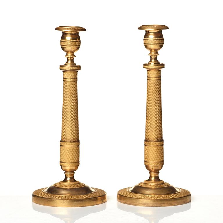 A pair of Empire candlesticks.