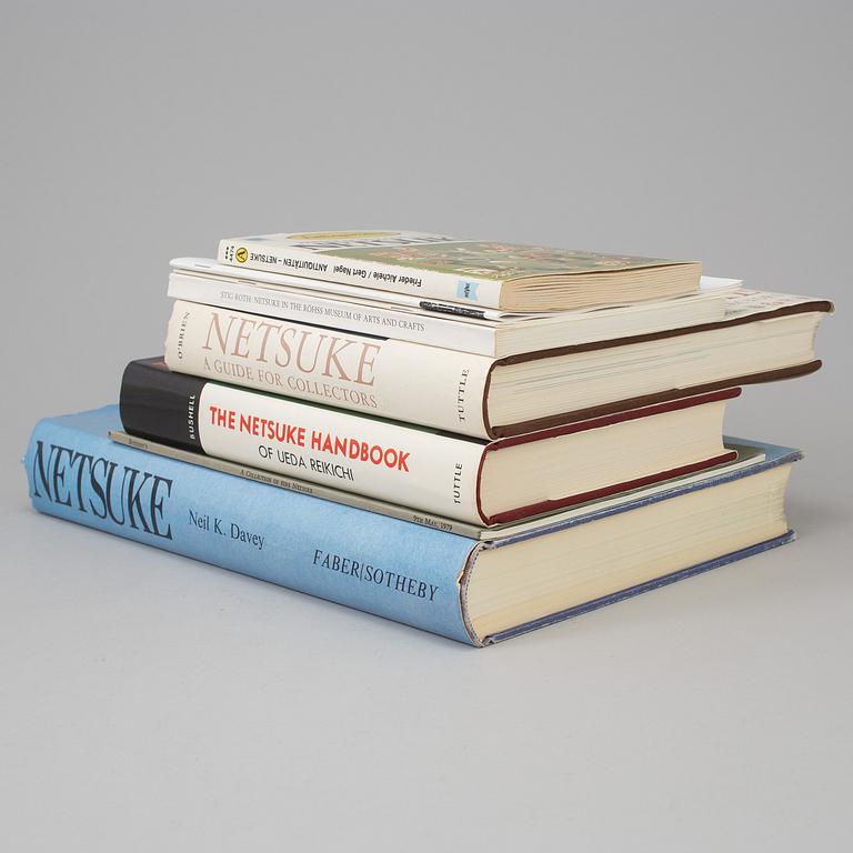 A set of five books about Netsuke, and a catalog.