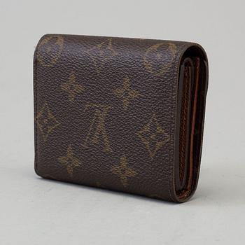 a LOUIS VUITTON 'Helene' wallet.