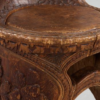 Knut Fjaestad, an Art Nouveau folk art sculptured pine chair, Sweden early 1900's.