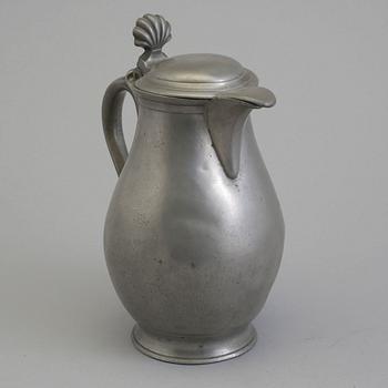 A 18th century tin pot.