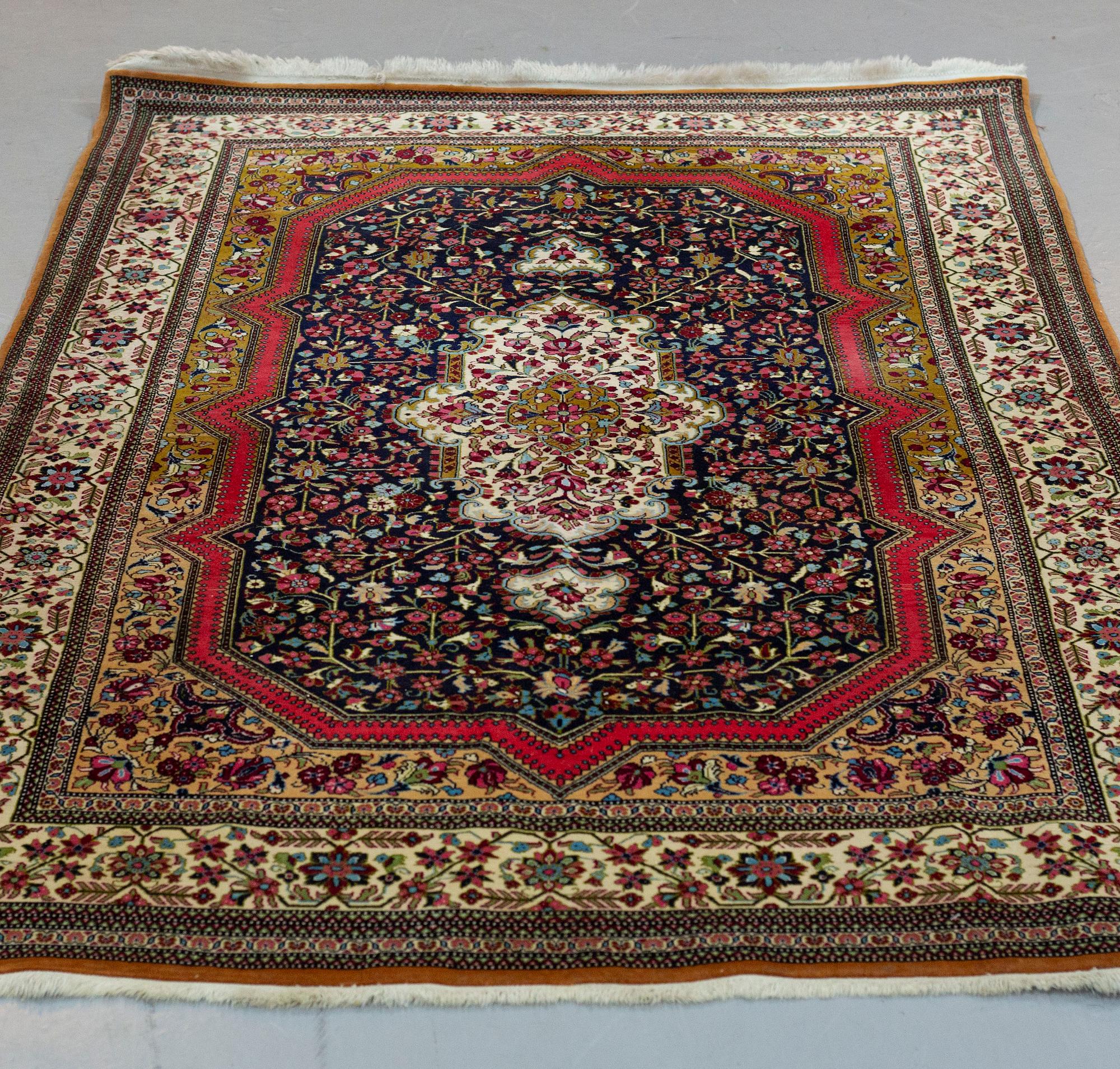 A RUG, Old Qum, ca 216 x 140 cm.