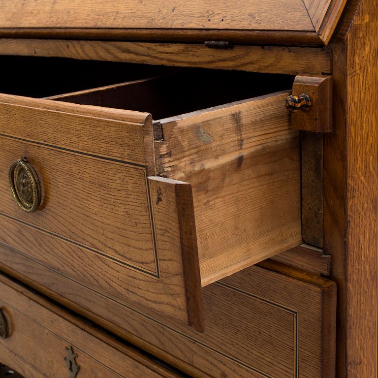 A first half of the 18th century oak writing cabinet.