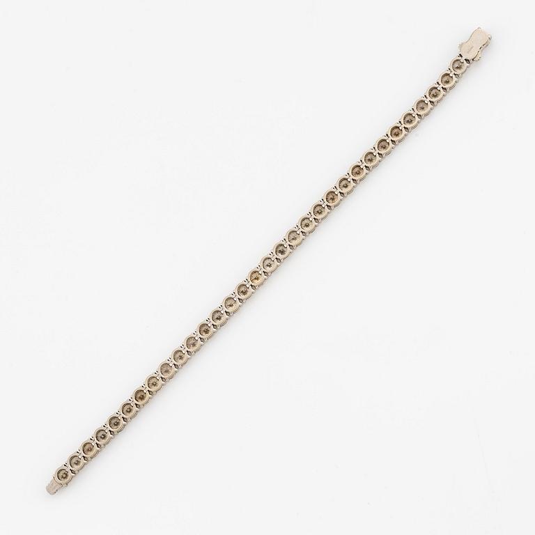 Armband 14K vitguld med runda briljantslipade diamanter.