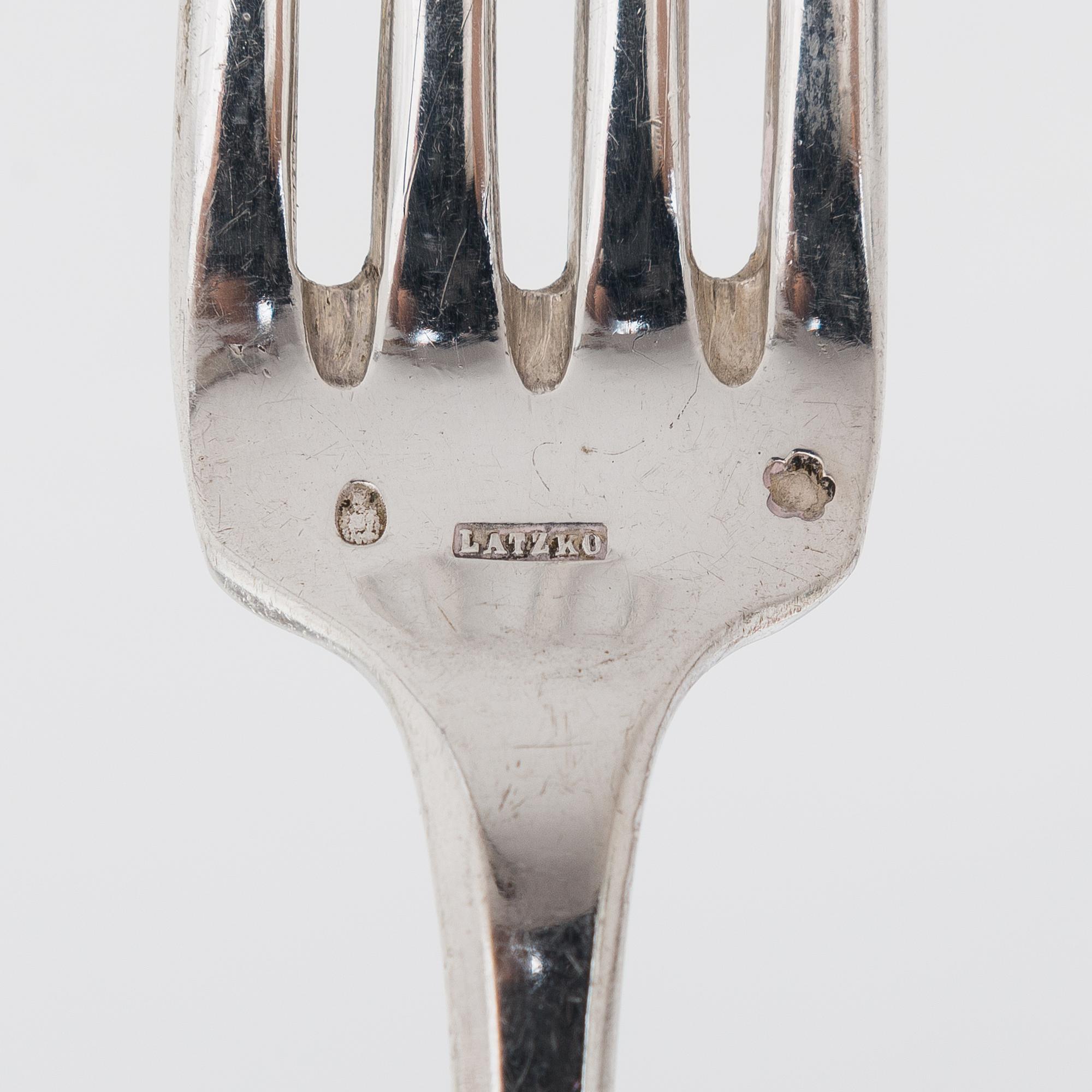 A 24-piece set of Latzko silver cutlery, Pest, Austro-Hungarian Empire 1878-1922.