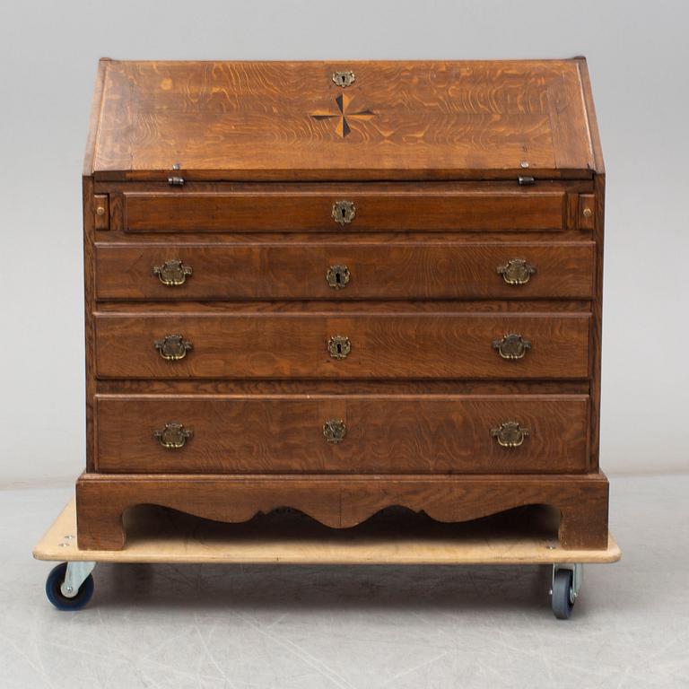 A mid 18th century oak secretaire.