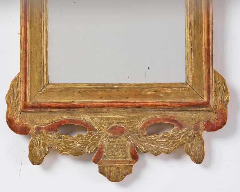 A pair of Gustavian giltwood mirrors by N. Falkengren (master in Jönköping 1776-1813).