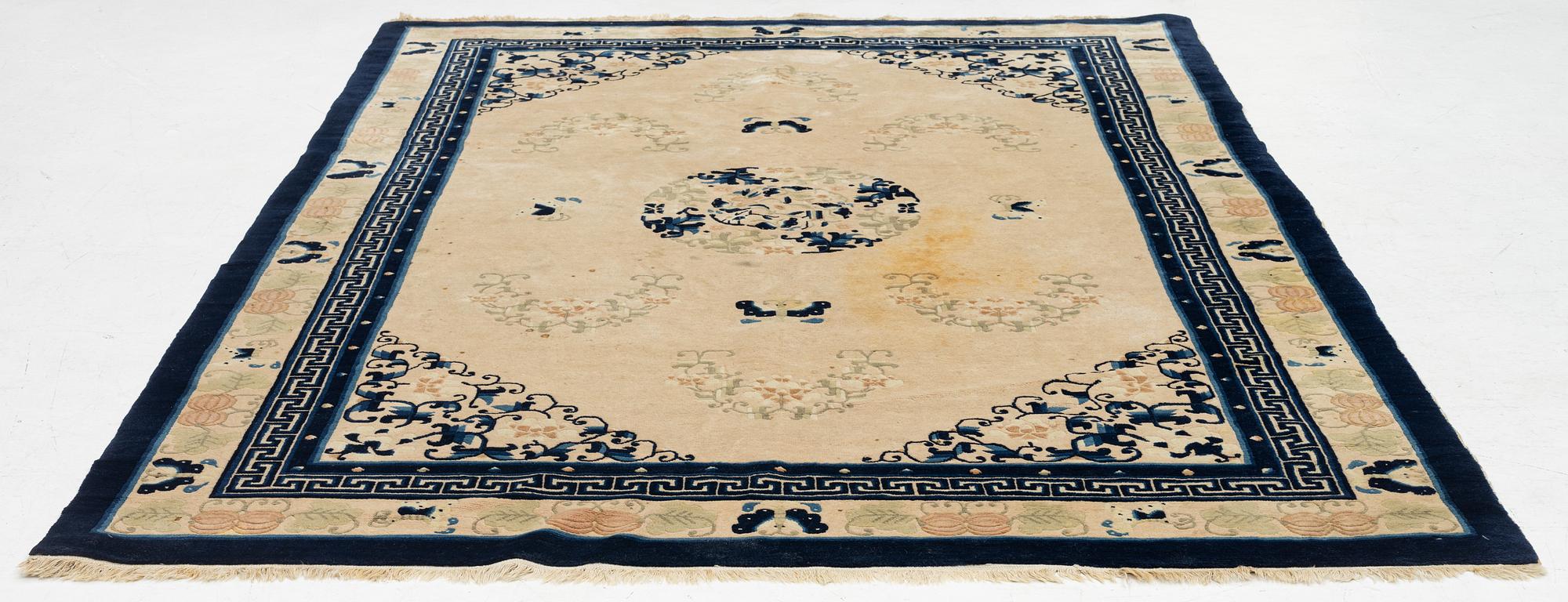 A carpet, old, China (antique finish), c. 276 x 189 cm.