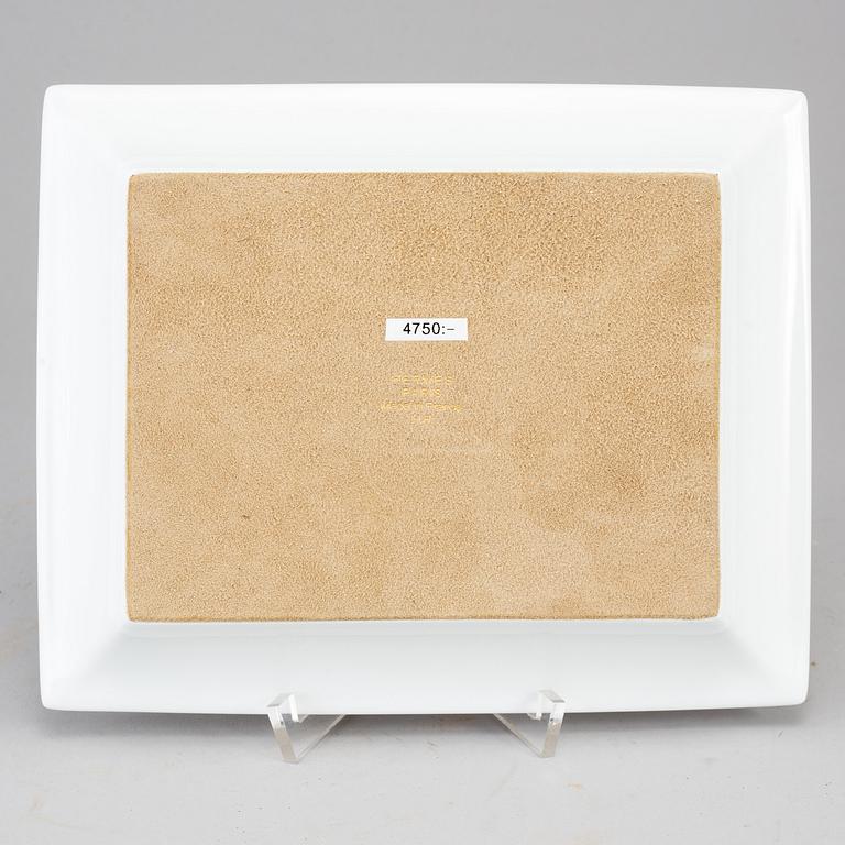 HERMÈS, a porcelain change tray.