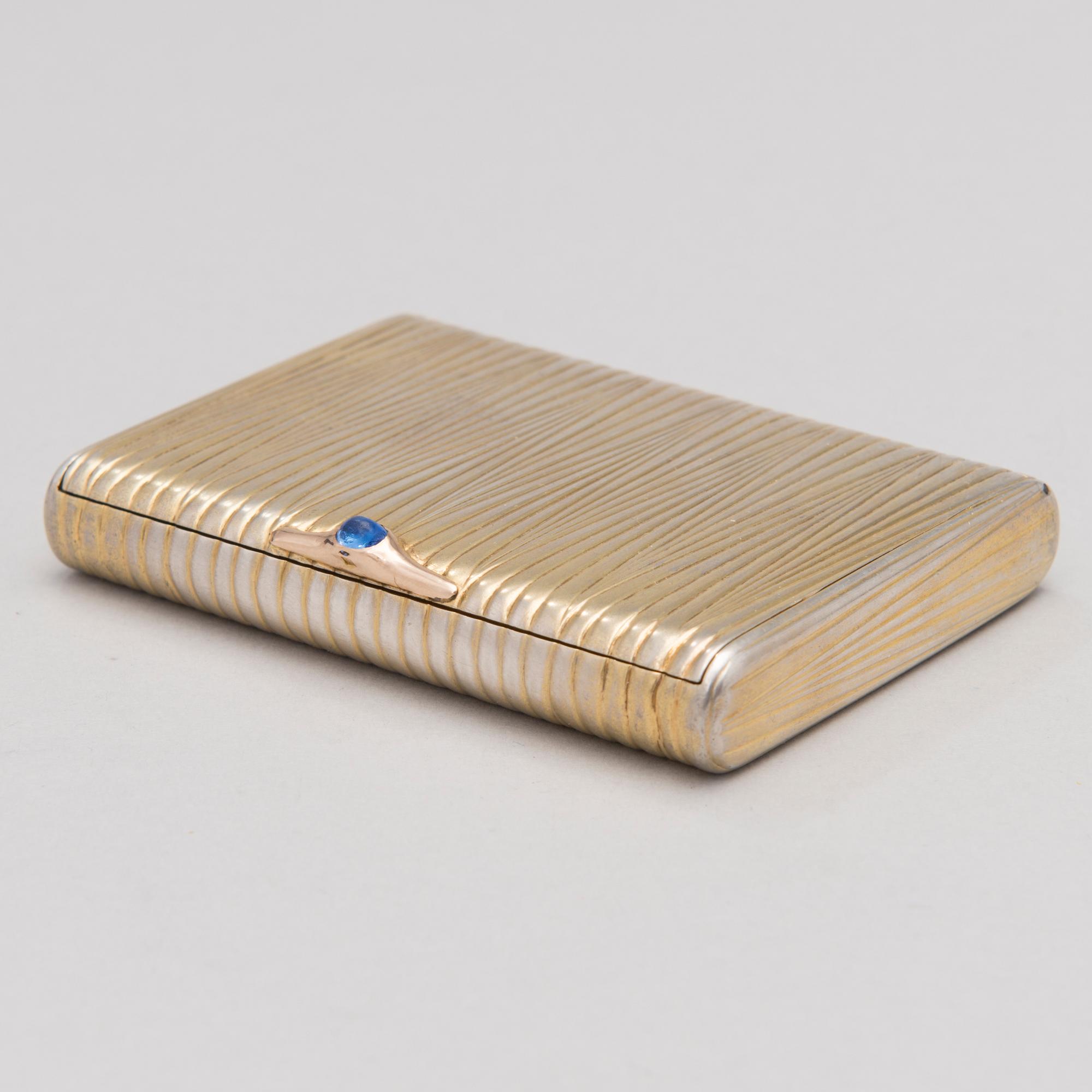 A Russian gilt silver cigarette case, maker's mark 'AR', Saint Petersburg 1908-17.