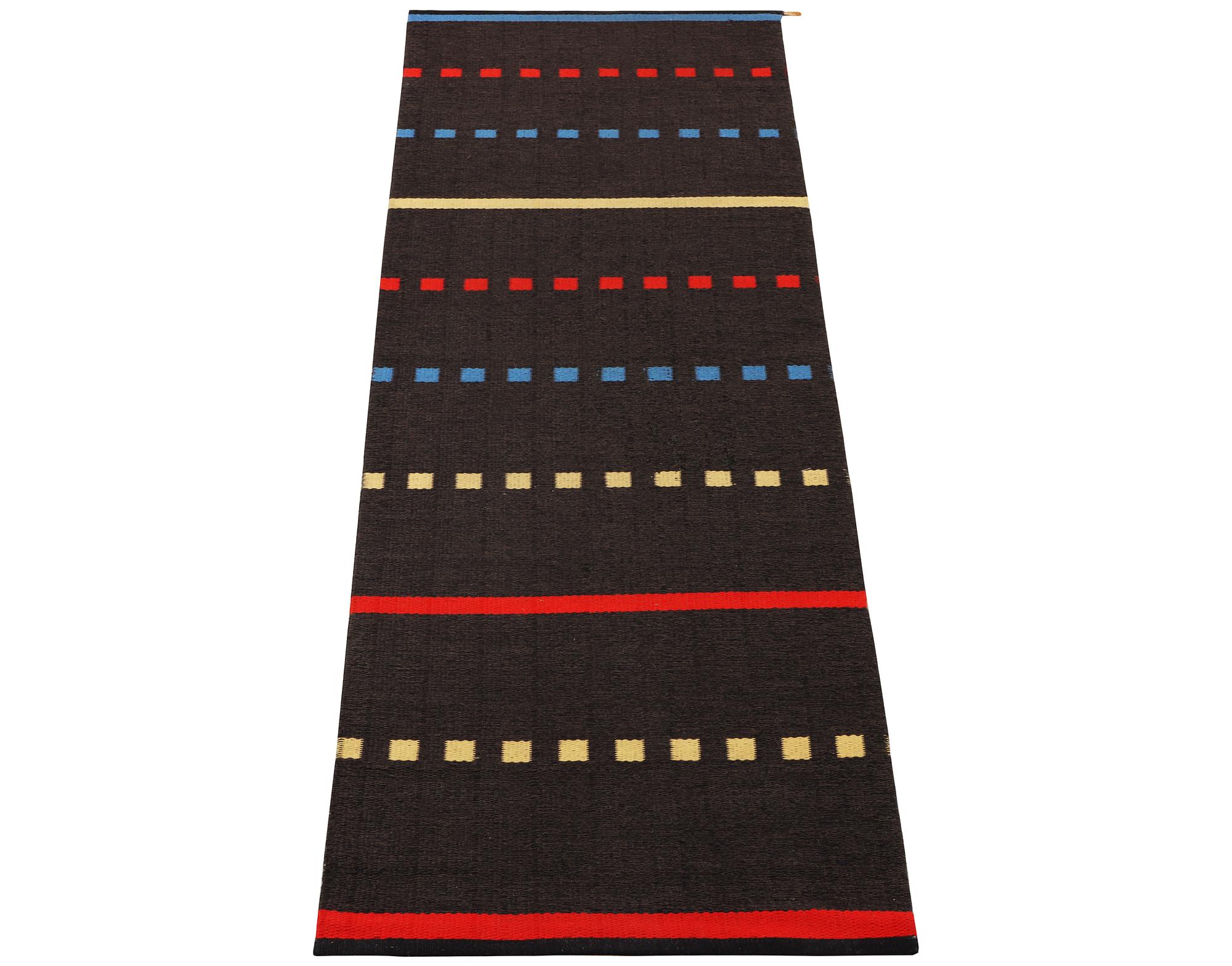 A runner carpet, Kasthall, c. 370 x 85 cm.