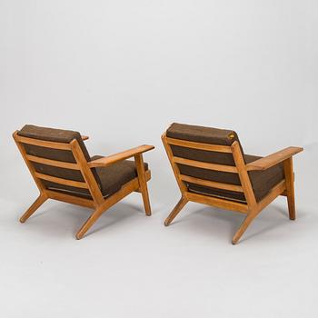 Hans J. Wegner, a pair of 'GE 290' armchairs with ottoman for Getama, Gedsted, Denmark.