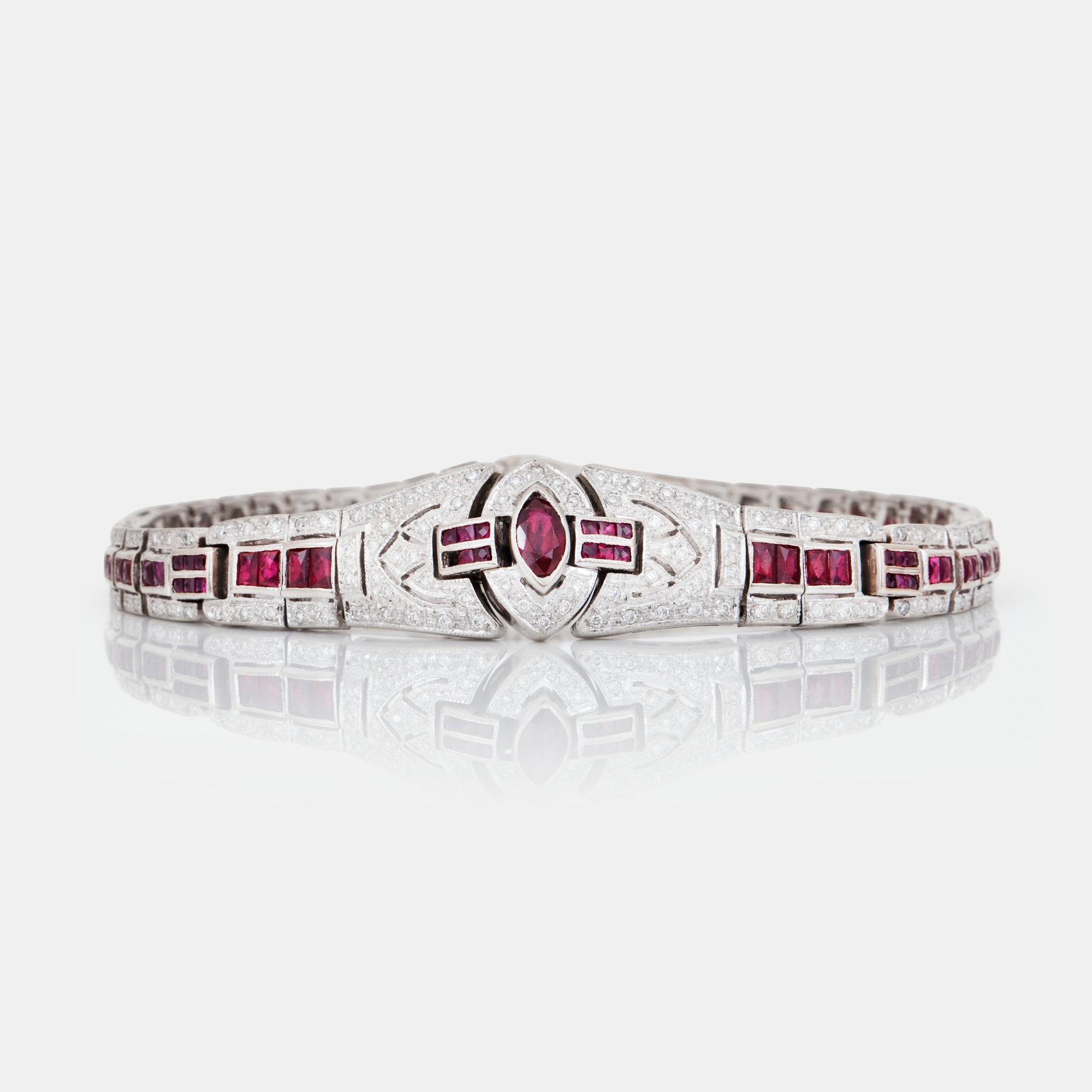 A brilliant-cut diamond and ruby bracelet.