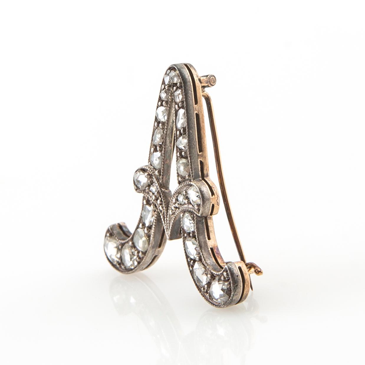 Brosch 18K rött och vitt guld med rosenslipade diamanter, K & E Carlson Göteborg 1938.