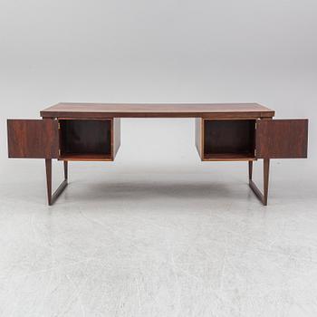 A 1960's rosewood desk by Kai Kristiansen, Feldballes Møbelfabrik, Denmark.