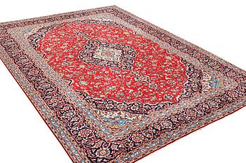 A Kashan carpet, c. 412 x 300 cm.